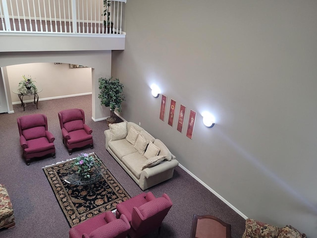 N113W16241 Sylvan Cir Unit 110, Germantown, WI 53022 - carpeted living area featuring baseboards