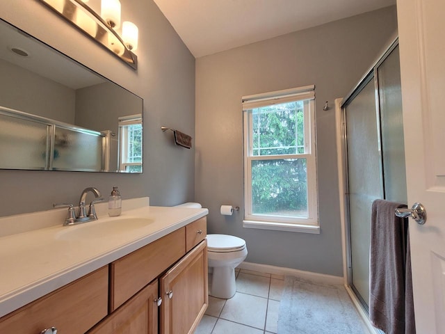 N113W16241 Sylvan Cir Unit 110, Germantown, WI 53022 - bathroom with vanity, a shower with shower door, and tile patterned flooring