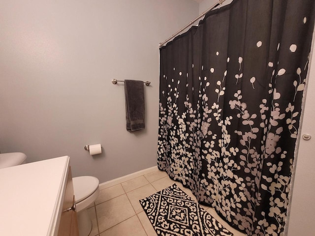 N113W16241 Sylvan Cir Unit 110, Germantown, WI 53022 - bathroom with tile patterned flooring, curtained shower, and vanity