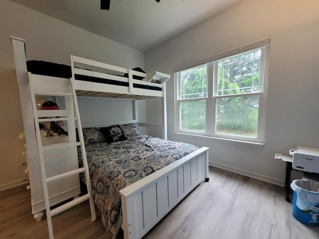 N113W16241 Sylvan Cir Unit 110, Germantown, WI 53022 - bedroom with light wood-style floors and baseboards