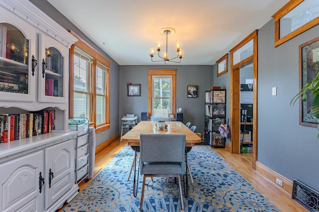 1756 Church St, Stevens Point, WI 54481 - dining room with a chandelier and light wood finished floors