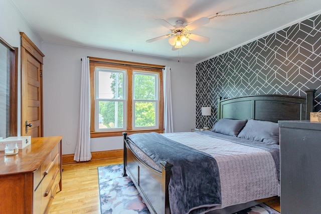 1756 Church St, Stevens Point, WI 54481 - bedroom featuring light wood-type flooring, ornamental molding, and ceiling fan