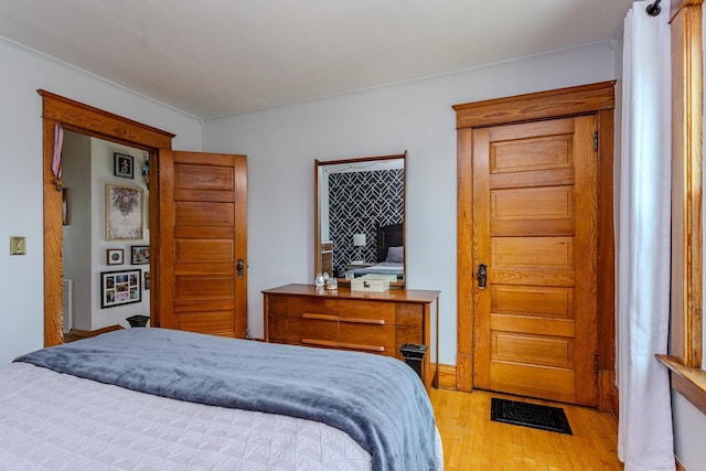 1756 Church St, Stevens Point, WI 54481 - bedroom featuring light wood finished floors and crown molding