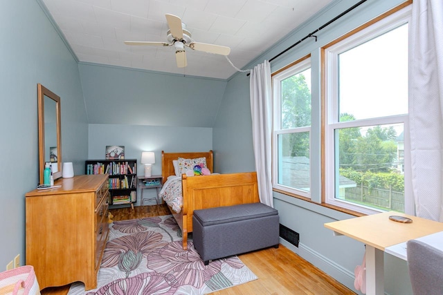1756 Church St, Stevens Point, WI 54481 - bedroom featuring wood finished floors, lofted ceiling, and a ceiling fan