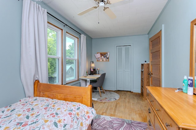 1756 Church St, Stevens Point, WI 54481 - bedroom featuring light wood-style flooring, a closet, and a ceiling fan