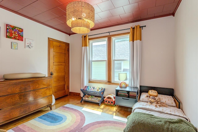 1756 Church St, Stevens Point, WI 54481 - bedroom featuring ornamental molding and wood finished floors