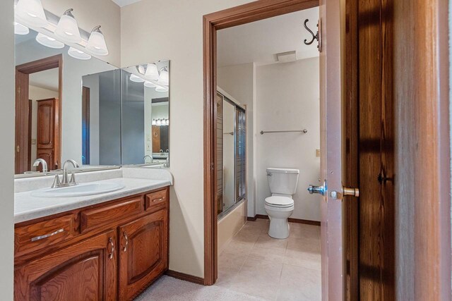 1820 Ridgeway Dr Unit 12A, De Pere, WI 54115 - full bathroom featuring vanity, tile patterned floors, and shower / bath combination with glass door
