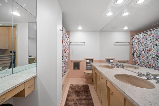 1610 N Prospect Ave Unit 1104, Milwaukee, WI 53202 - bathroom featuring recessed lighting, double vanity, shower / tub combo, tile patterned floors, and tile walls