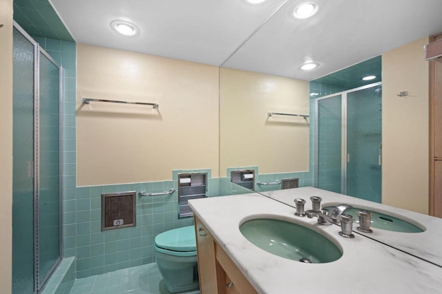 1610 N Prospect Ave Unit 1104, Milwaukee, WI 53202 - full bath with a shower stall, vanity, tile walls, recessed lighting, and tile patterned flooring
