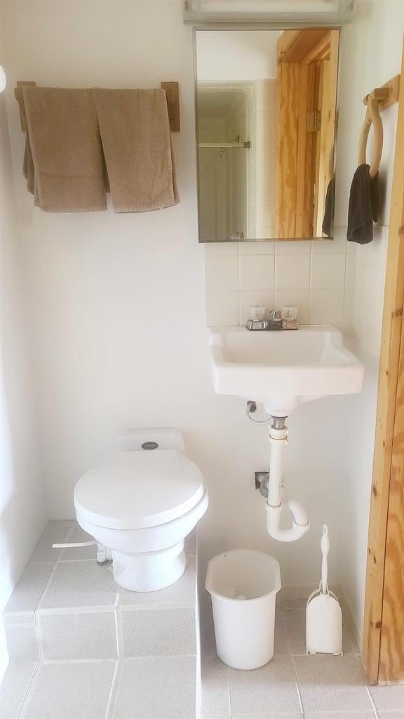 W4799 Rocky Hill Dr, Pembine, WI 54156 - bathroom featuring toilet and tile patterned flooring