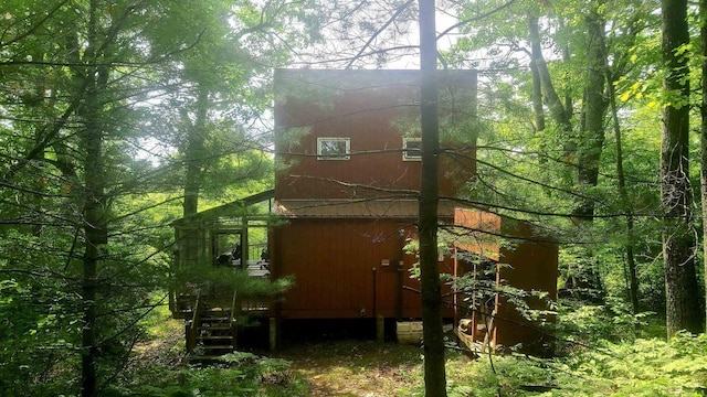 W4799 Rocky Hill Dr, Pembine, WI 54156 - view of side of property with a barn and a wooded view