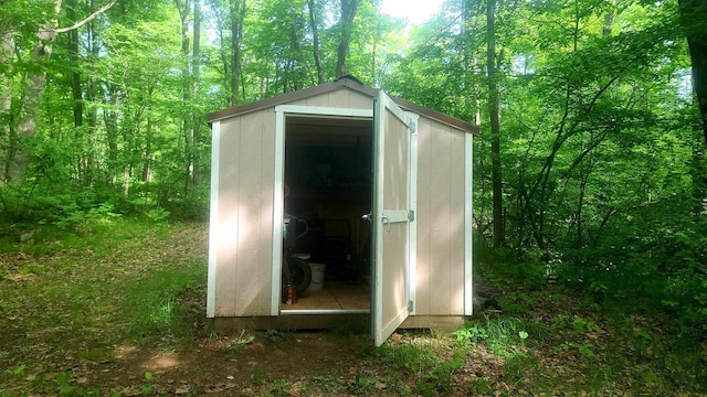 W4799 Rocky Hill Dr, Pembine, WI 54156 - view of shed with a forest view