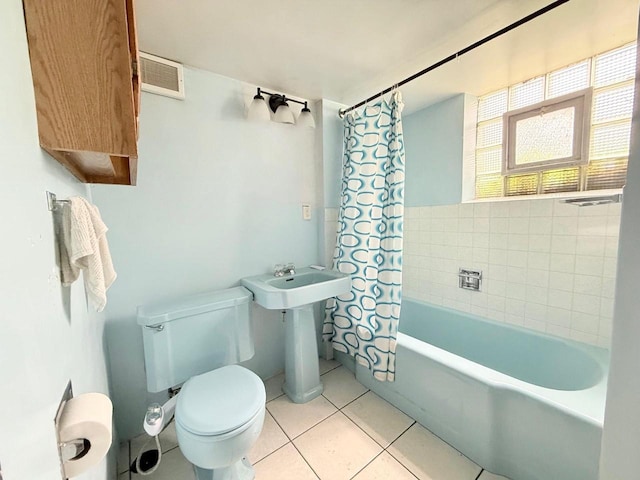 5391 Westport Rd, Madison, WI 53704 - bathroom with tile patterned floors and shower / bath combo
