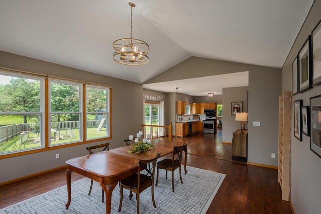 3637 121st Pl, Pleasant Prairie, WI 53158 - dining room with lofted ceiling, a chandelier, and dark wood finished floors