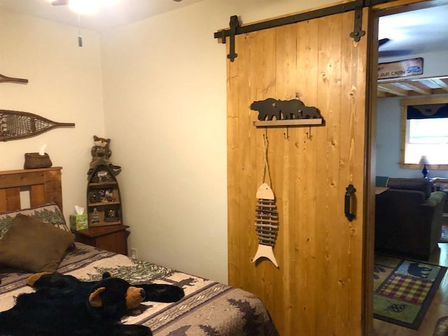 W15036 Poachers Run Ln, Athelstane, WI 54101 - bedroom with a barn door