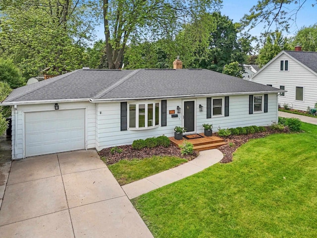 625 N Winnebago St, De Pere, WI 54115 - single story home featuring concrete driveway, an attached garage, a front yard, a chimney, and roof with shingles