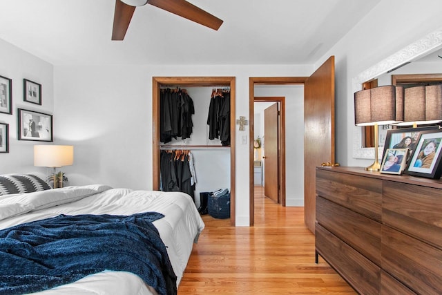 625 N Winnebago St, De Pere, WI 54115 - bedroom featuring light wood-style floors, a closet, and ceiling fan