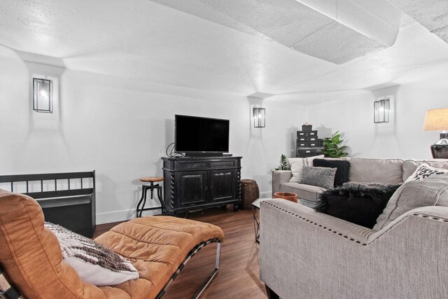 625 N Winnebago St, De Pere, WI 54115 - living area with dark wood-style flooring and a textured ceiling