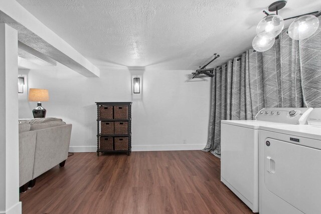 625 N Winnebago St, De Pere, WI 54115 - laundry room featuring washer and dryer, wood finished floors, and a textured ceiling