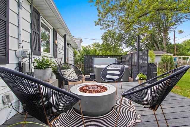 625 N Winnebago St, De Pere, WI 54115 - wooden terrace featuring a fire pit