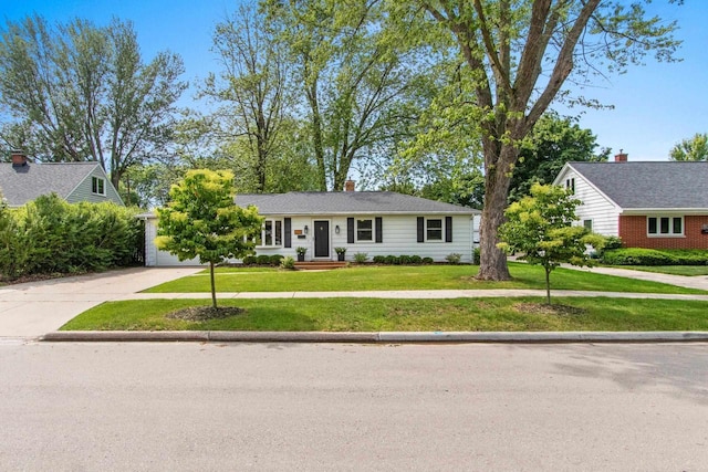 625 N Winnebago St, De Pere, WI 54115 - view of front of property with concrete driveway and a front lawn