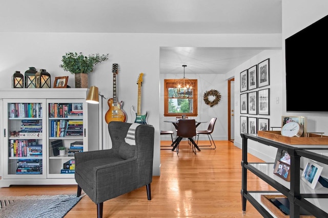 625 N Winnebago St, De Pere, WI 54115 - living area with a chandelier and light wood finished floors