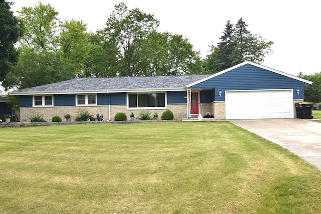 8383 N 50th St, Brown Deer, WI 53223 - single story home with an attached garage, brick siding, concrete driveway, and a front lawn