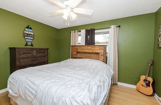 8383 N 50th St, Brown Deer, WI 53223 - bedroom with wood finished floors and a ceiling fan