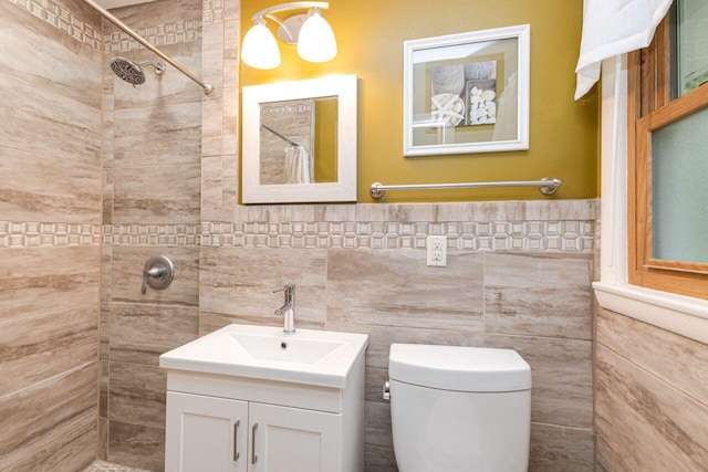 8383 N 50th St, Brown Deer, WI 53223 - bathroom featuring tile walls, a tile shower, and vanity