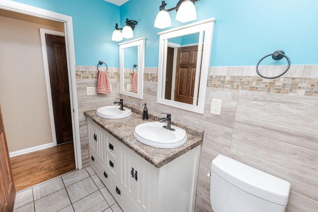 8383 N 50th St, Brown Deer, WI 53223 - bathroom with tile walls and double vanity