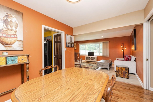 8383 N 50th St, Brown Deer, WI 53223 - dining room featuring wood finished floors and baseboards