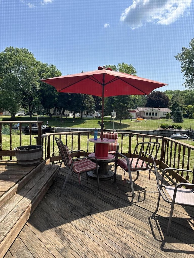 6610 Kelly Ln, Winneconne, WI 54986 - wooden deck with a lawn