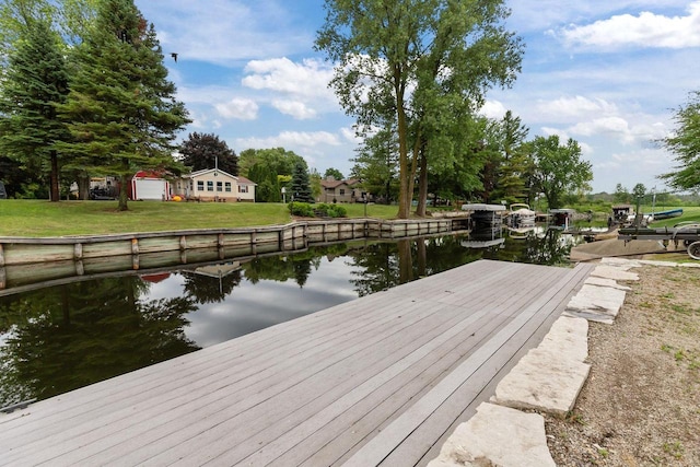 6610 Kelly Ln, Winneconne, WI 54986 - dock area with a water view and a yard
