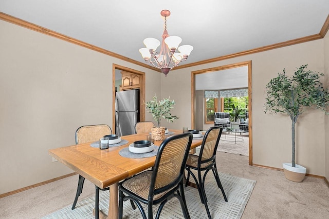 2939 W Roselawn Dr, Appleton, WI 54914 - dining space with light colored carpet, a chandelier, and crown molding