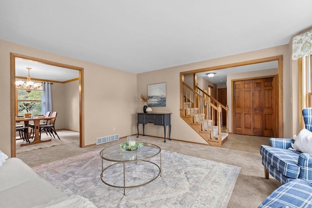 2939 W Roselawn Dr, Appleton, WI 54914 - living room with carpet floors, a chandelier, and stairs