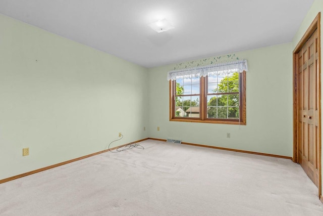 2939 W Roselawn Dr, Appleton, WI 54914 - unfurnished bedroom featuring a closet and light carpet