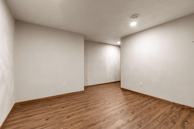 2939 W Roselawn Dr, Appleton, WI 54914 - spare room with wood finished floors, recessed lighting, and a smoke detector