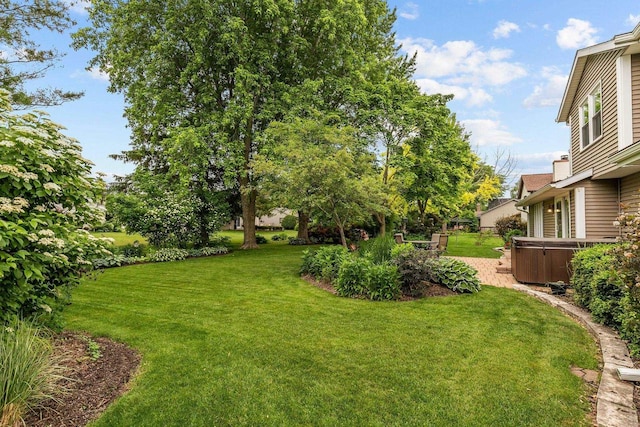 2939 W Roselawn Dr, Appleton, WI 54914 - view of green lawn featuring a hot tub
