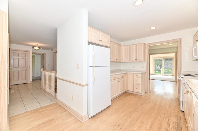 540 Mc Aurther Ln Unit B, Brookfield, WI 53045 - kitchen featuring white appliances, light wood-type flooring, light countertops, cream cabinetry, and recessed lighting