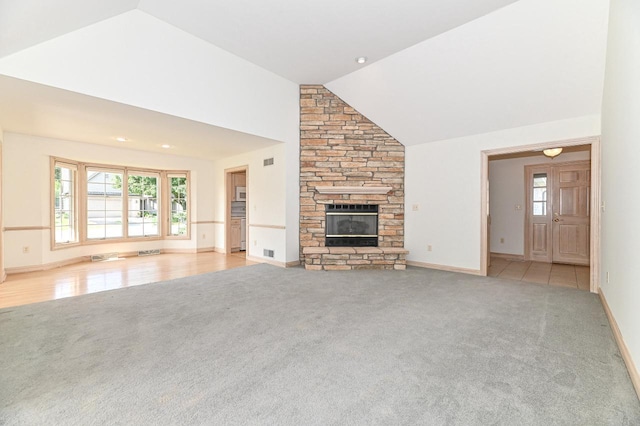 540 Mc Aurther Ln Unit B, Brookfield, WI 53045 - unfurnished living room with light carpet, a fireplace, and high vaulted ceiling
