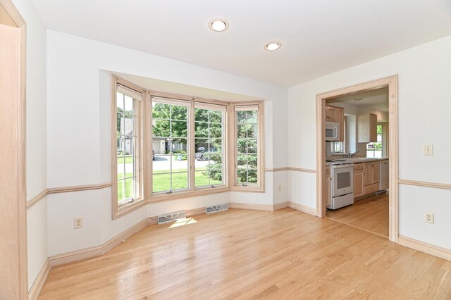 540 Mc Aurther Ln Unit B, Brookfield, WI 53045 - unfurnished room with light wood-style floors and recessed lighting