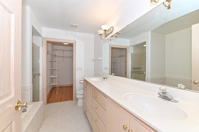 540 Mc Aurther Ln Unit B, Brookfield, WI 53045 - full bathroom with a walk in closet, double vanity, tile patterned floors, and a shower