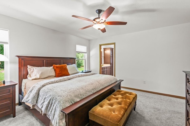 1734 Arthurs Pass, Oconomowoc, WI 53066 - bedroom featuring light colored carpet, ceiling fan, and ensuite bath