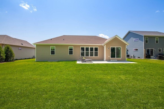 1734 Arthurs Pass, Oconomowoc, WI 53066 - back of property featuring a patio and a yard