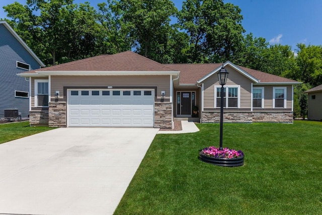 1734 Arthurs Pass, Oconomowoc, WI 53066 - view of front of home featuring stone siding, an attached garage, driveway, and a front lawn