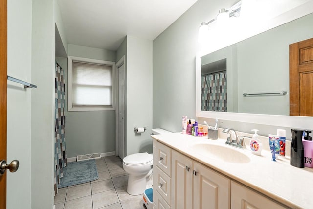 1615 Palamino Dr, Racine, WI 53402 - bathroom featuring vanity, tile patterned floors, and a shower with shower curtain
