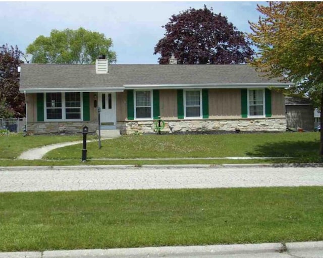 248 E Norport Dr, Port Washington, WI 53074 - ranch-style house with stone siding, a chimney, and a front lawn