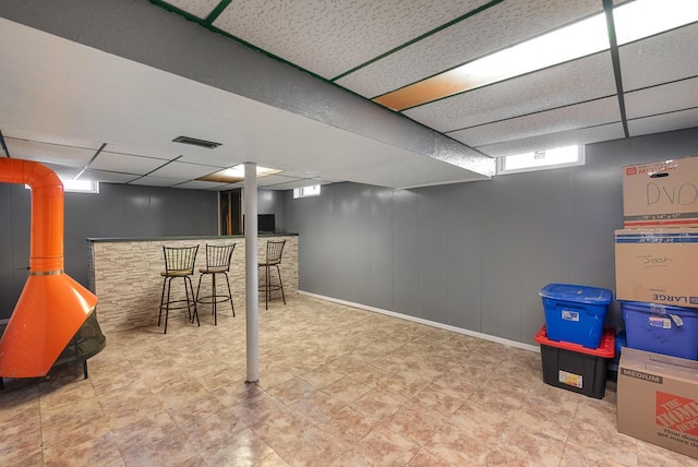 248 E Norport Dr, Port Washington, WI 53074 - below grade area featuring a paneled ceiling and a dry bar