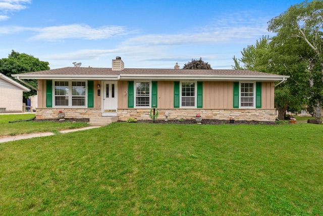 248 E Norport Dr, Port Washington, WI 53074 - ranch-style home featuring stone siding, board and batten siding, a chimney, a front lawn, and a shingled roof