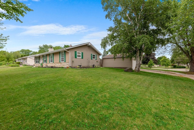 248 E Norport Dr, Port Washington, WI 53074 - view of side of home featuring a chimney and a lawn